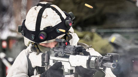 A Swedish soldier takes part in Nordic Response military exercise on the Finland/Norway border / Leon Neal