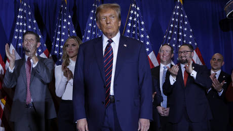  US President-elect Donald Trump takes the stage with supporters, campaign staff and family members for a primary night party.