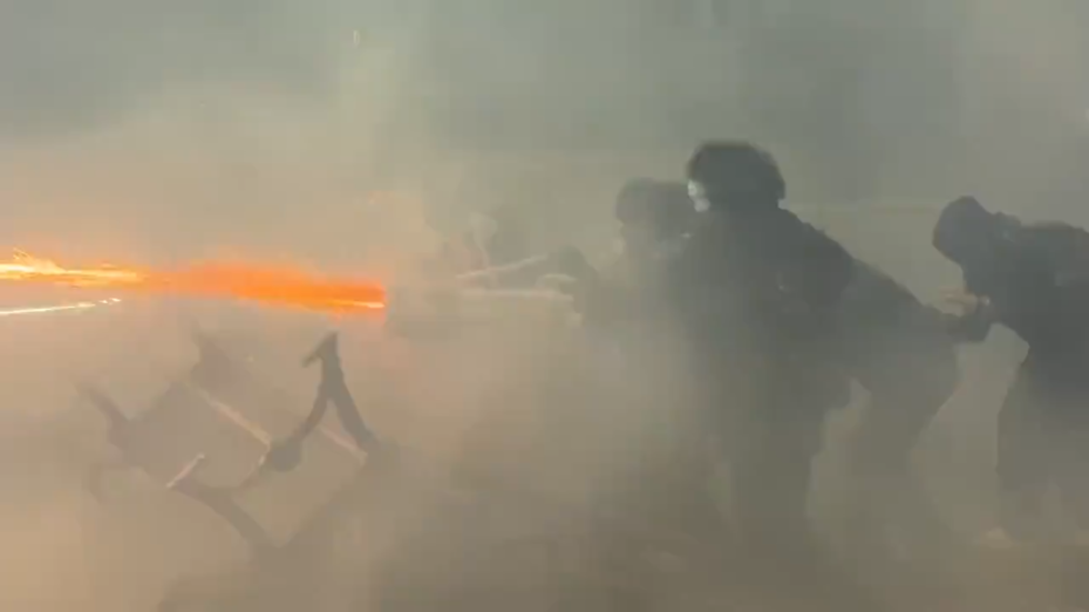 WATCH Pro-EU protesters use ‘fireworks minigun’ in Tbilisi