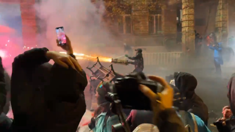 Protesters launch fireworks at police in Tbilisi, Georgia, November 30, 2024.