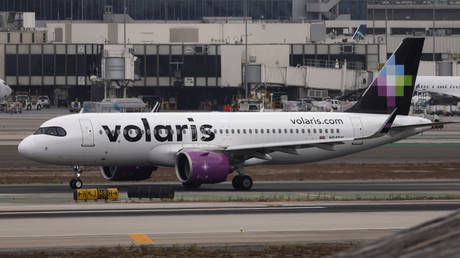 FILE PHOTO: A Volaris Airbus A320 aircraft taxis at Los Angeles International Airport.