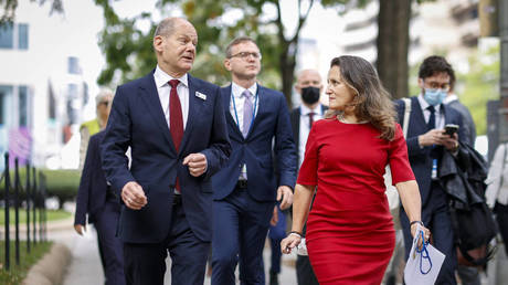 FILE PHOTO: Olaf Scholz and Chrystia Freeland.