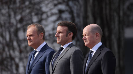 FILE PHOTO: (From L to R) Polish Prime Minister Donald Tusk, French President Emmanuel Macron and German Chancellor Olaf Scholz.