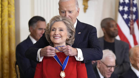 Biden Awards Medal of Freedom to Clinton, Soros, and Chef Photographed with Alleged Trump Attacker