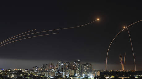 FILE PHOTO: Israel's Iron Dome missile defense system fires interceptors