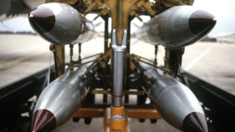 FILE PHOTO: A frontal view of four B-61 nuclear gravity bombs on a cart