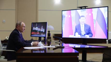 Russian President Vladimir Putin speaking with Chinese President Xi Jinping on January 21, 2025.