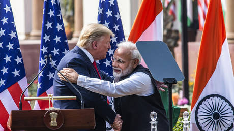 US President Donald Trump and Prime Minister Narendra Modi greet each other after their joint statement, at Hyderabad House, on February 25, 2020 in New Delhi, India.