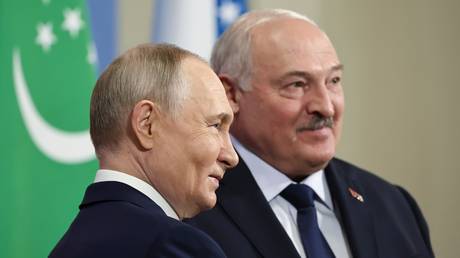 FILE PHOTO: Russian President Vladimir Putin and Belarusian President Alexander Lukashenko attend a photo opportunity before an informal meeting of Commonwealth of Independent States heads of state at the Igora resort, in Leningrad region, Russia.