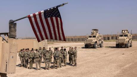 US soldiers prepare to go out on patrol in northeastern Syria.