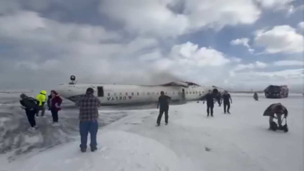 Plane flips on landing at Toronto airport