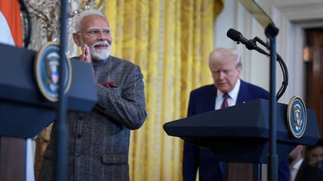 US President Donald Trump and Indian Prime Minister Narendra Modi arrive for a joint press conference in the East Room at the White House on February 13, 2025 in Washington, DC.