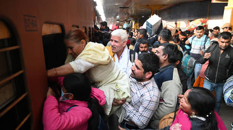 Heavy rush in New Delhi railway station passenger going to Prayagraj for attending Kumbh Mela on February 11, 2025 in New Delhi, India. 20 million people are expected to take dip in Ganga at Prayagraj Mahakumbh on occasion of Maaghi Purnima Amrit Snan.