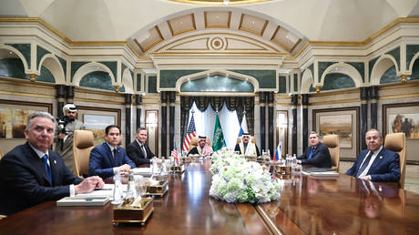 Russian Foreign Minister Sergey Lavrov (R) and Russian President Vladimir Putin's Foreign Policy Advisor Yuri Ushakov (2nd R) attend a meeting between Russia and the United States, in Riyadh, Saudi Arabia, on February 18, 2025.