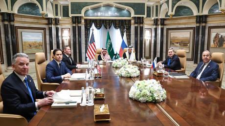 Russian Foreign Minister Sergey Lavrov (R) and Russian President Vladimir Putin's Foreign Policy Advisor Yuri Ushakov (2nd R) attend a meeting between Russia and the United States, in Riyadh, Saudi Arabia, on February 18, 2025.