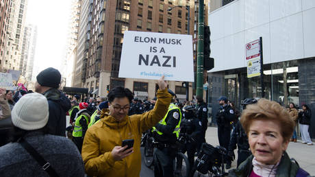 Protesters gather by Gold Coast Tesla dealership in Chicago, Illinois, United Sates on March 8, 2025.