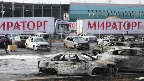 Burned vehicles in a parking lot after a Ukrainian drone attack on Moscow Region, Russia