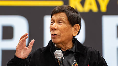 Former Philippine President Rodrigo Duterte gives a speech during a campaign rally   in Hong Kong, China, March 9, 2025