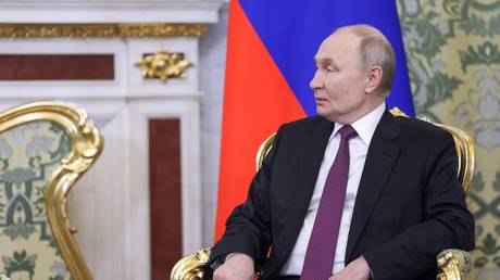 Russian President Vladimir Putin attends a meeting with Belarusian President Alexander Lukashenko at the Kremlin in Moscow, Russia.