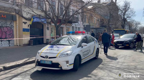 Ukrainian police officers at the scene of the murder