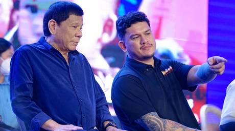 FILE PHOTO. Rodrigo Roa Duterte and Sebastian Duterte.