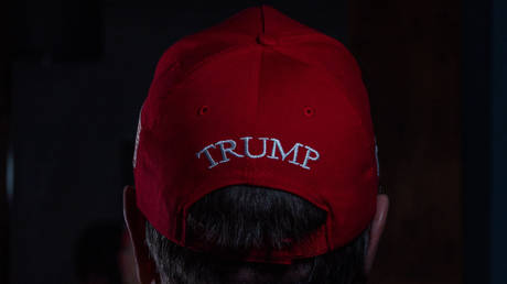 A man wears a Make America Great Again (MAGA) baseball cap supporting US President Donald Trump, on February 1, 2025 in Sidmouth, England.