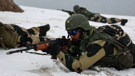 FILE PHOTO: An Indian Border Security Forces patrol near the Line of Control in North Kashmir, May 4, 2025.