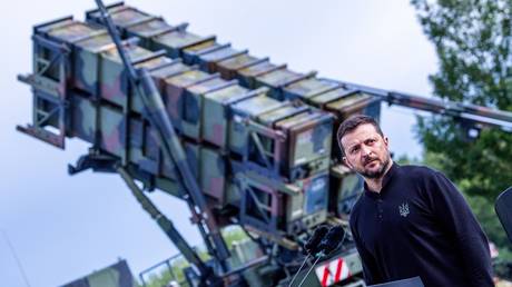 FILE PHOTO: Ukraine’s Vladimir Zelensky in front of a Patriot air defense missile system, in Germany, June 2024.