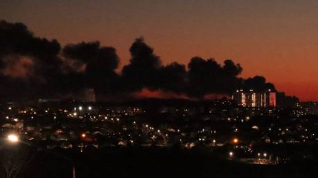  Smoke above an airfield following a drone attack in Kursk, Russia.