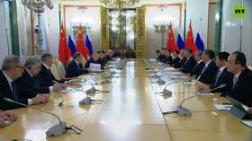 Putin and Xi Jinping meet in Moscow