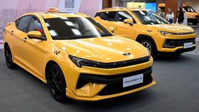 Putin signs new ‘made in Russia’ taxi law