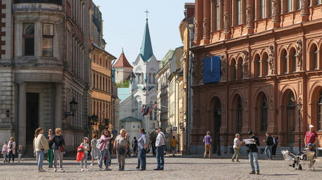 FILE PHOTO: People are seen in Riga, Latvia.