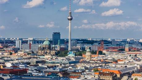 Russian journalist says Germany seized passports of his wife and daughter
