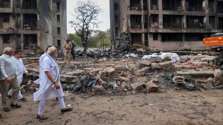 Narendra Modi visits plane crash site and meets sole survivor