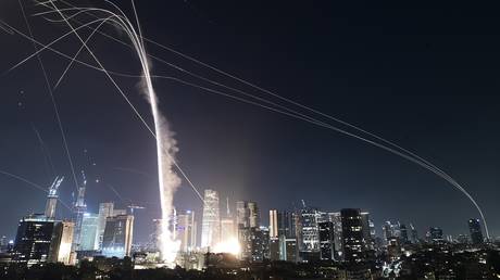 Israeli air defenses engage missiles over Tel Aviv, on June 13, 2025.