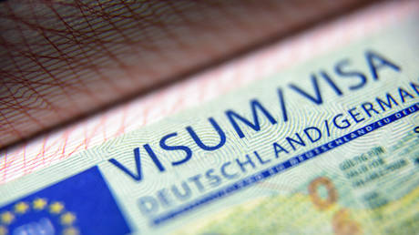 FILE PHOTO. Visa stamp in passport.