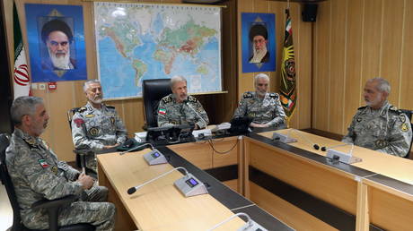 Iranian Army Commander-in-Chief Amir Hatami monitors developments at the Combat Command Room in Tehran, Iran, June 23, 2025.