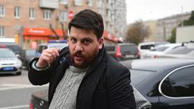 Ex-Navalny aide gets 18-year prison sentence