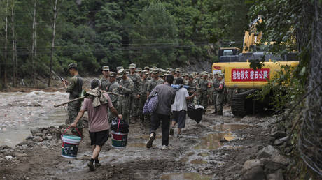 Dozens killed after China records almost a year of rainfall in days (VIDEOS)