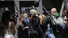 French investigators raid HQ of biggest opposition party