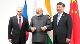 China backs trilateral cooperation with Russia and India