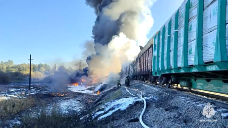 Train derailment causes major fire in Russia