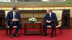 Putin meets with Vucic in China