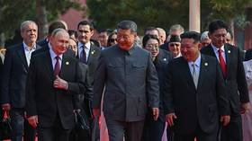 Xi, Putin, and Kim joke about living to 150 in hot-mic chat