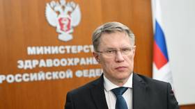 Russian health minister saves tourist mid-flight (VIDEO)