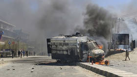 Curfew imposed in India’s border region after violent clashes injure dozens