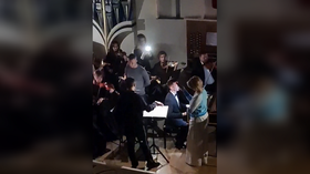 WATCH Russian orchestra play on in blackout caused by Ukrainian attack
