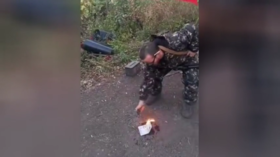 Man fighting for Russia burns his UK passport (VIDEO)