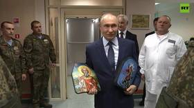 LATEST: Putin visits wounded Ukraine conflict vets