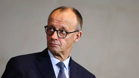 German chancellor with Nazi family past likens Putin to Hitler